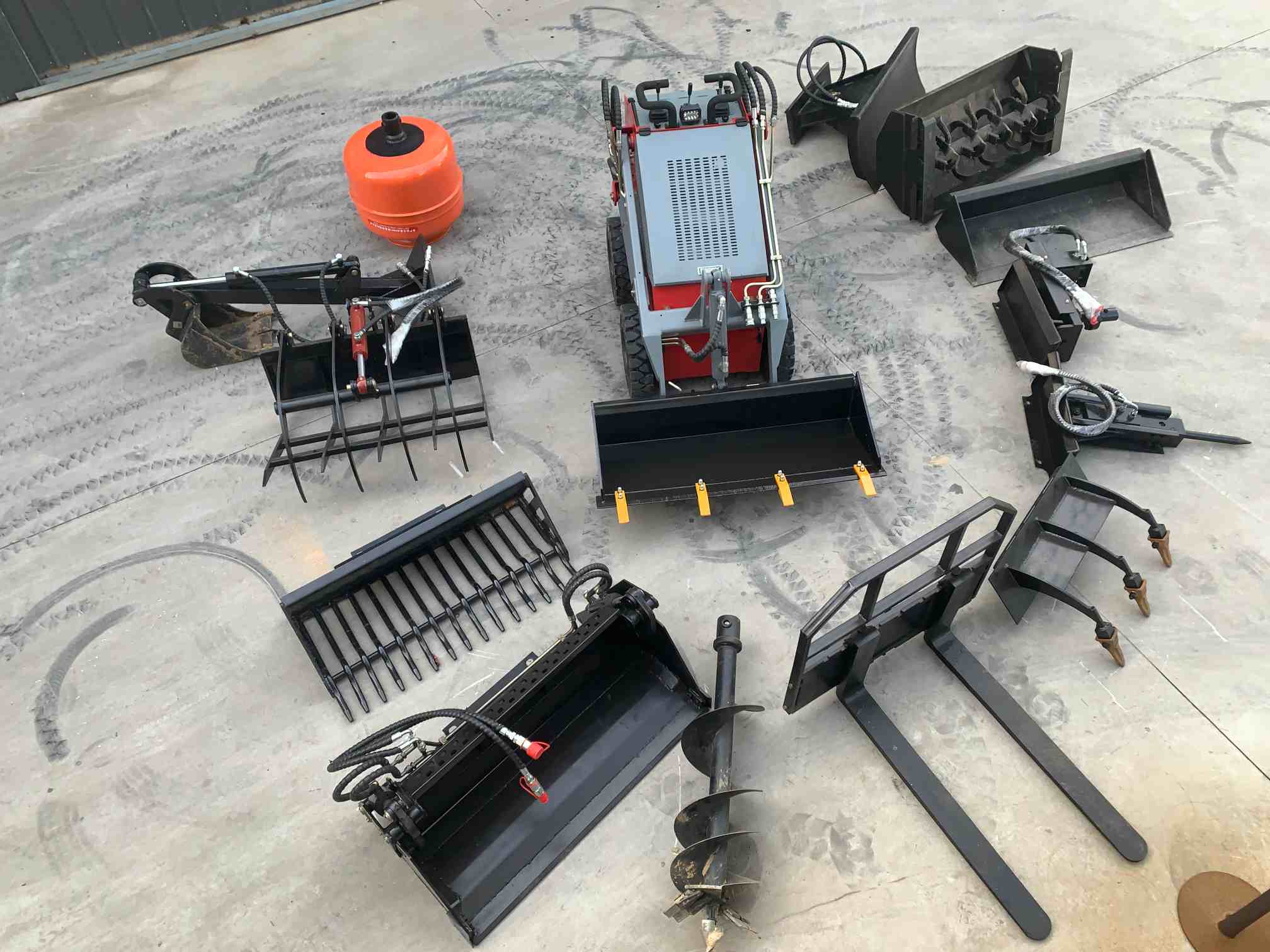 Various attachments for skid steer loader